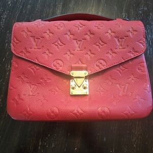 Louis Vuitton Red Satchel with Embossed Monogram Pattern